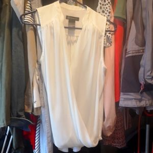 Sleeveless blouse good for office wear. Good used condition.